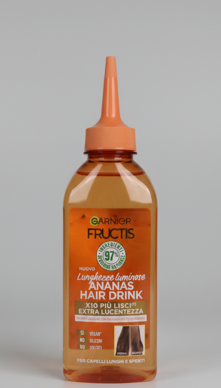 Garnier Fructis Hair Drink Ananas Lamellare 200 ml, balsamo a risciacquo per capelli lunghi e spenti, formula vegana con 97% ingredienti di origine naturale senza siliconi e senza solfati, arricchito con estratto di ananas e tecnologia lamellare per rendere i capelli fino a 10 volte più lisci, ultra lucenti e visibilmente più setosi in pochi secondi.