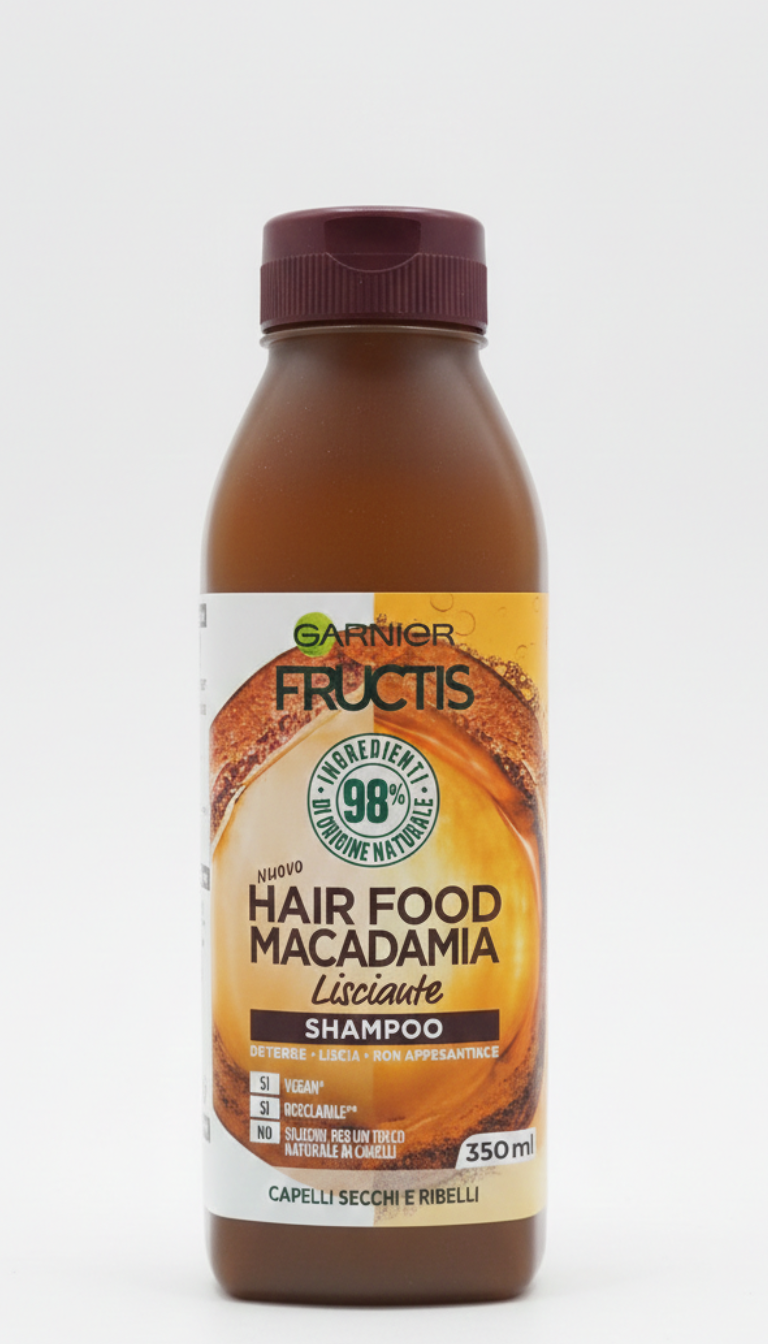 Garnier Fructis Hair Food Shampoo Macadamia Lisciante 350 ml, shampoo disciplinante per capelli secchi e ribelli, formula vegana con 98% ingredienti di origine naturale e senza siliconi, arricchito con olio di macadamia e olio di cocco per capelli più lisci, morbidi, luminosi e senza crespo.