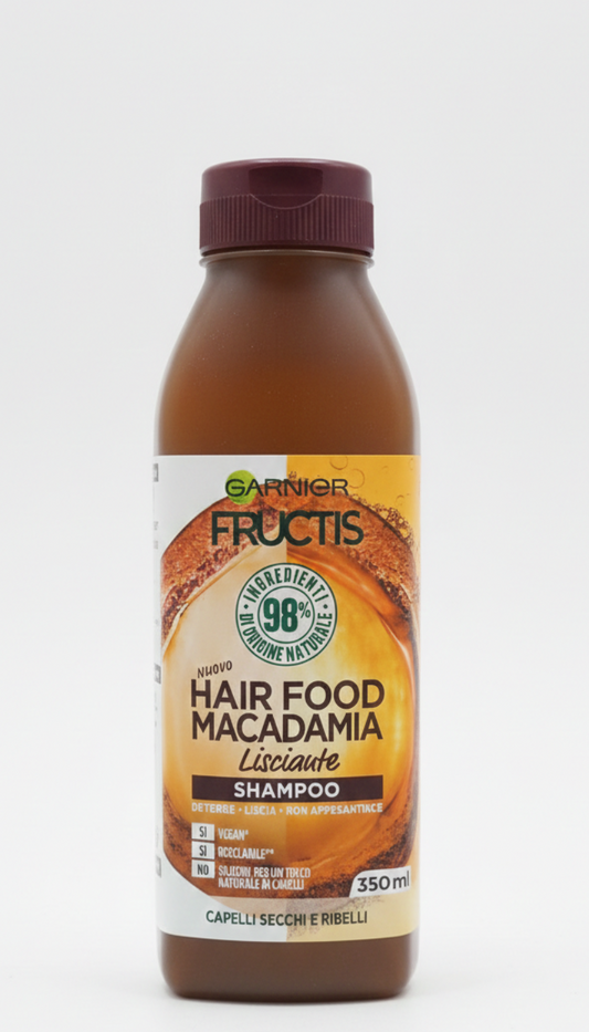 Garnier Fructis Hair Food Shampoo Macadamia Lisciante 350 ml, shampoo disciplinante per capelli secchi e ribelli, formula vegana con 98% ingredienti di origine naturale e senza siliconi, arricchito con olio di macadamia e olio di cocco per capelli più lisci, morbidi, luminosi e senza crespo.